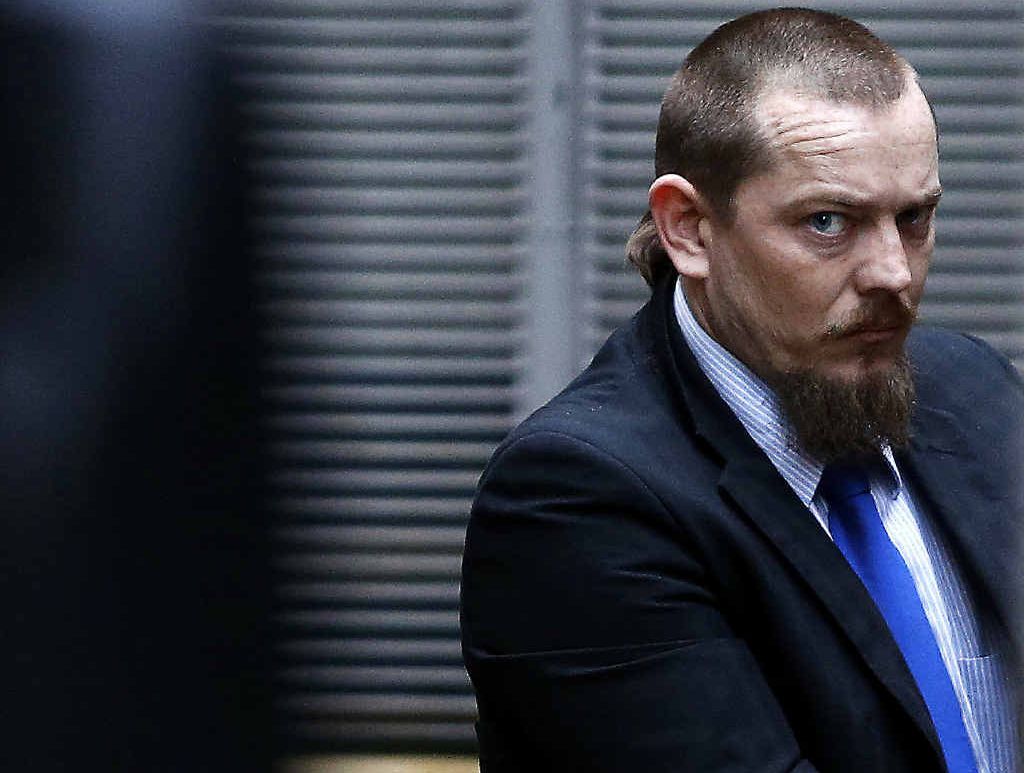 CHILD KILLER: Warren Ross pictured boarding a police car at the King St court in Sydney just after being found guilty of murdering two-year-old Tanilla Warrick-Deaves, the daughter of his girlfriend Donna Deaves, in August 2011. CHILD KILLER: Warren Ross pictured boarding a police car at the King St court in Sydney just after being found guilty of murdering two-year-old Tanilla Warrick-Deaves, the daughter of his girlfriend Donna Deaves, in August 2011.